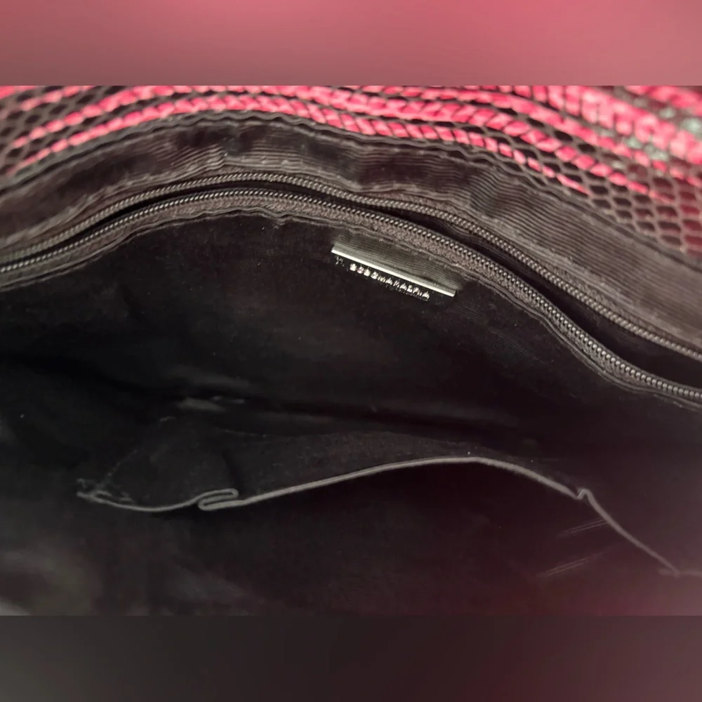 BCBGMaxazria Pink & Black Striped Clutch inside pockets with zipper. Very soft